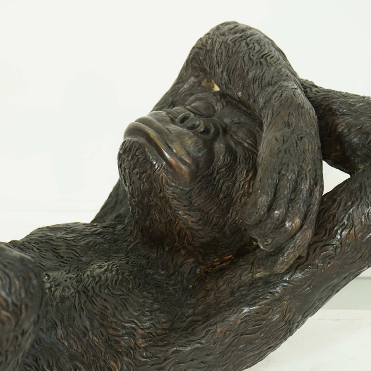 Bronze Laying Monkey Statue IronGate Garden Elements